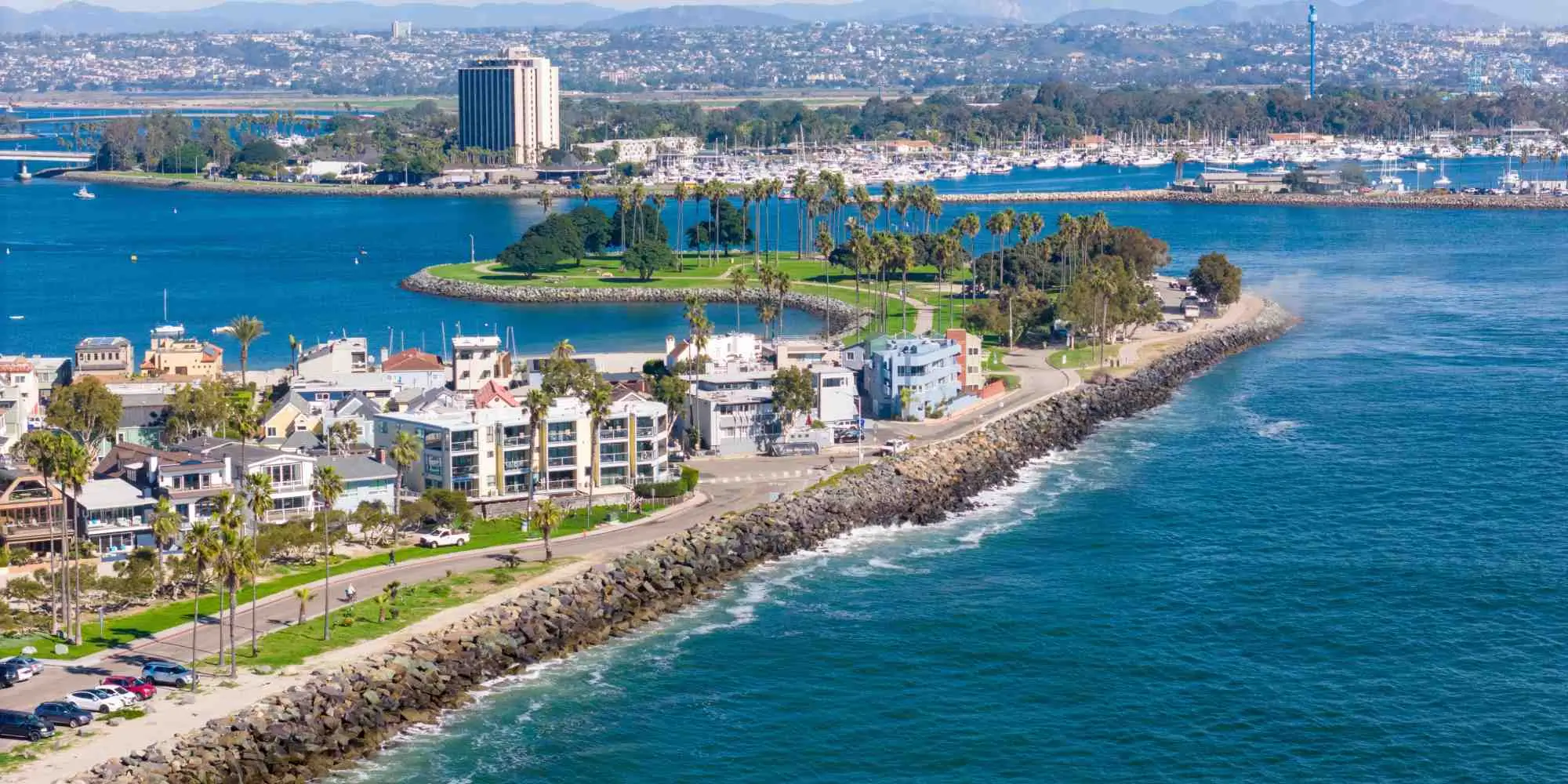 Sunny Southern California coastline with homes and palm trees